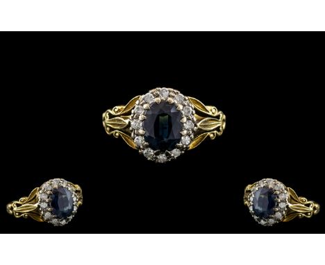 Antique Period - Attractive 18ct Gold and Platinum Diamond and Blue Sapphire Set Cluster Ring. The Central Blue Faceted Sapph