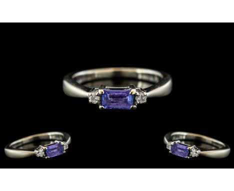 Ladies - Attractive Contemporary 9ct White Gold Aquamarine and Diamond Set Ring with Full Hallmark for 9.375. The Rectangular