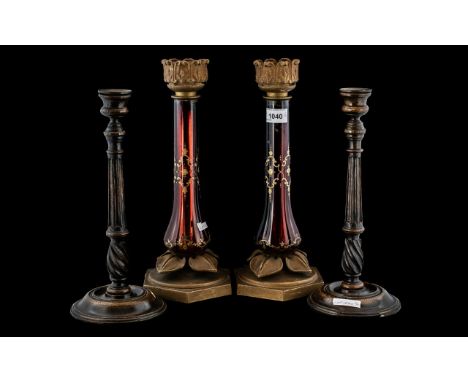A Pair of Ruby Glass Candle Holders, gilt painted ruby glass supports, with metal mounts.  Height 14''.  Together with a pair