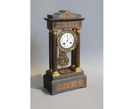 A 19th century French marquetry inlaid and gilt metal mounted ebonised eight day portico mantel clock, height 45cm