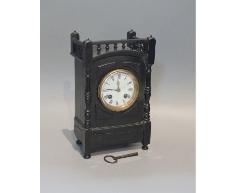 A late Victorian ebonised eight day mantel clock, height 27cm