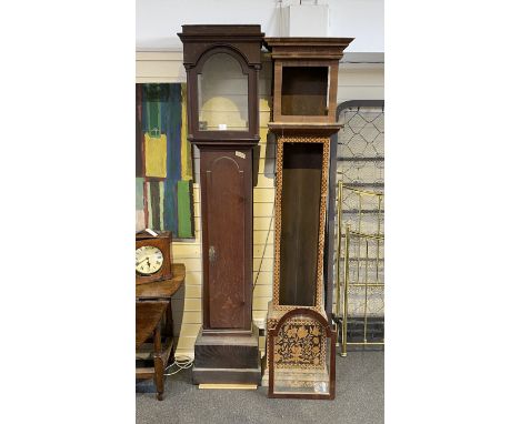 A George III oak longcase clock case and an inlaid clock case, larger 222 cm high.