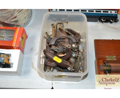 A box of vintage door handles etc