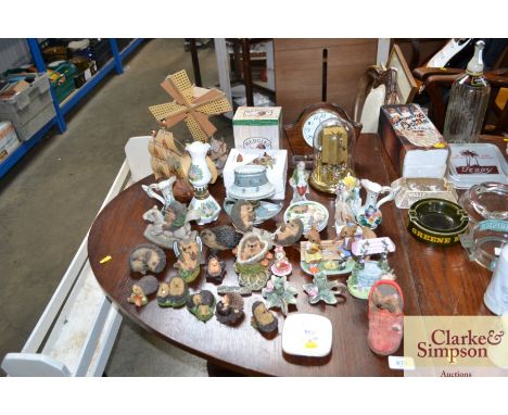 A quantity of various hedgehog ornaments and other ornaments; anniversary clock; mantel clock etc