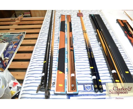 An as new snooker cue in as new blue and white patch case with extension