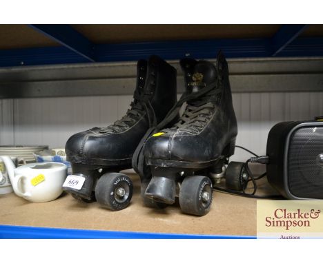 A pair of UK size 10 Sovereign roller skates
