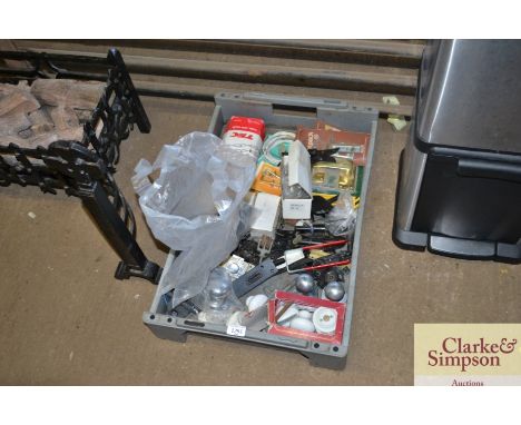 A box containing door handles, a steel jack chain etc.