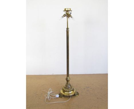An early 20th Century telescopic brass standard lamp