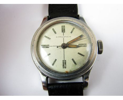 A 1940s Longines wrist watch, having a manual wind movement, serial number 6472445, in stainless steel case with screw-on bac