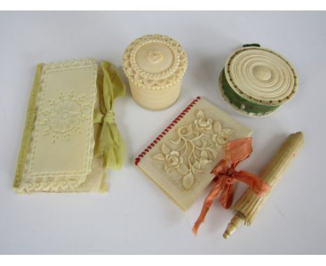 19th Century ivory and bone needlework tools, including a disc shaped pin cushion, a novelty needle case in the form of a par