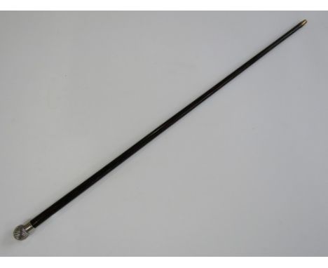 A Victorian silver-mounted palm wood walking cane with military provenance, the spirally reeded oblate pommel's collar engrav