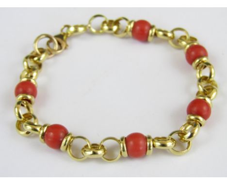 A contemporary coral and 18ct gold bracelet, 9.9 g total weight