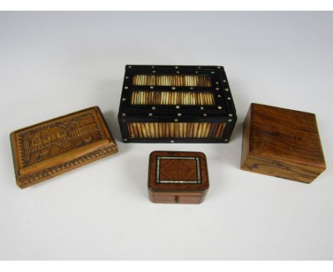 A 19th Century naive carved wooden snuff box, its hinged lid depicting a rustic cottage with animals, together with a porcupi