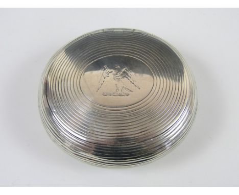 A Victorian silver squeeze-action snuff box, of compressed ovoid form, decorated with concentric bands surrounding a central 