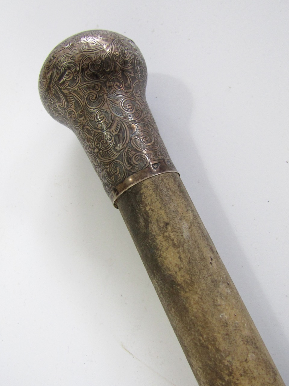 A Victorian silvermounted pizzle walking cane