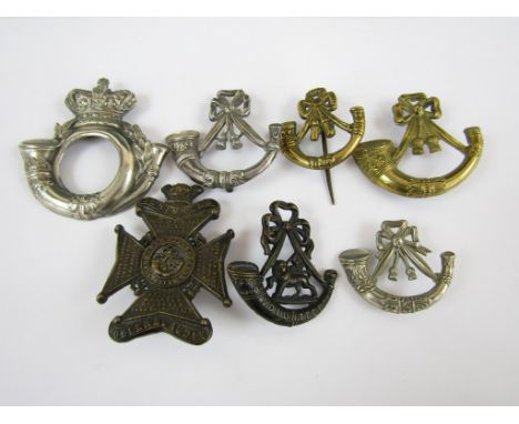 A quantity of Victorian and later Rifle Volunteers and Light Infantry insignia 