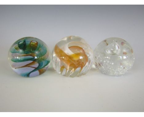 Three Caithness glass paperweights, including Misty, Grace and Twirl 