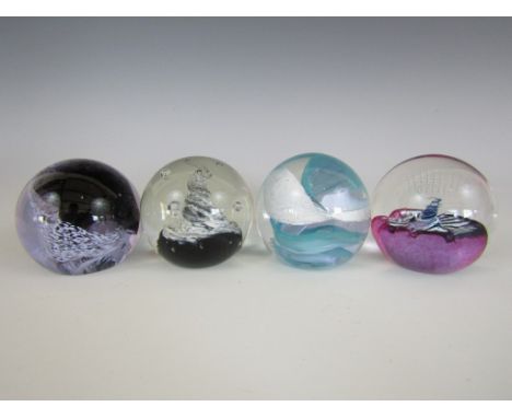 Four Caithness glass paperweights, including Pastel, Silkie, Tango and Streamers 