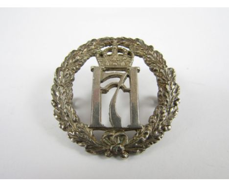 A free Norwegian army officer's silver cap badge, Birmingham, 1942