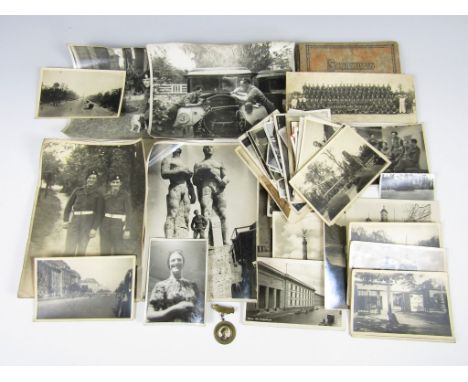 A quantity of photographs and a portrait locket pertaining to the Second World War military service of Reginald Albert Willia