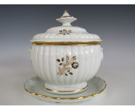 A Chamberlains Worcester porcelain sucrier and stand, of oval section, with gardrooned decoration and moulded loop handles, g