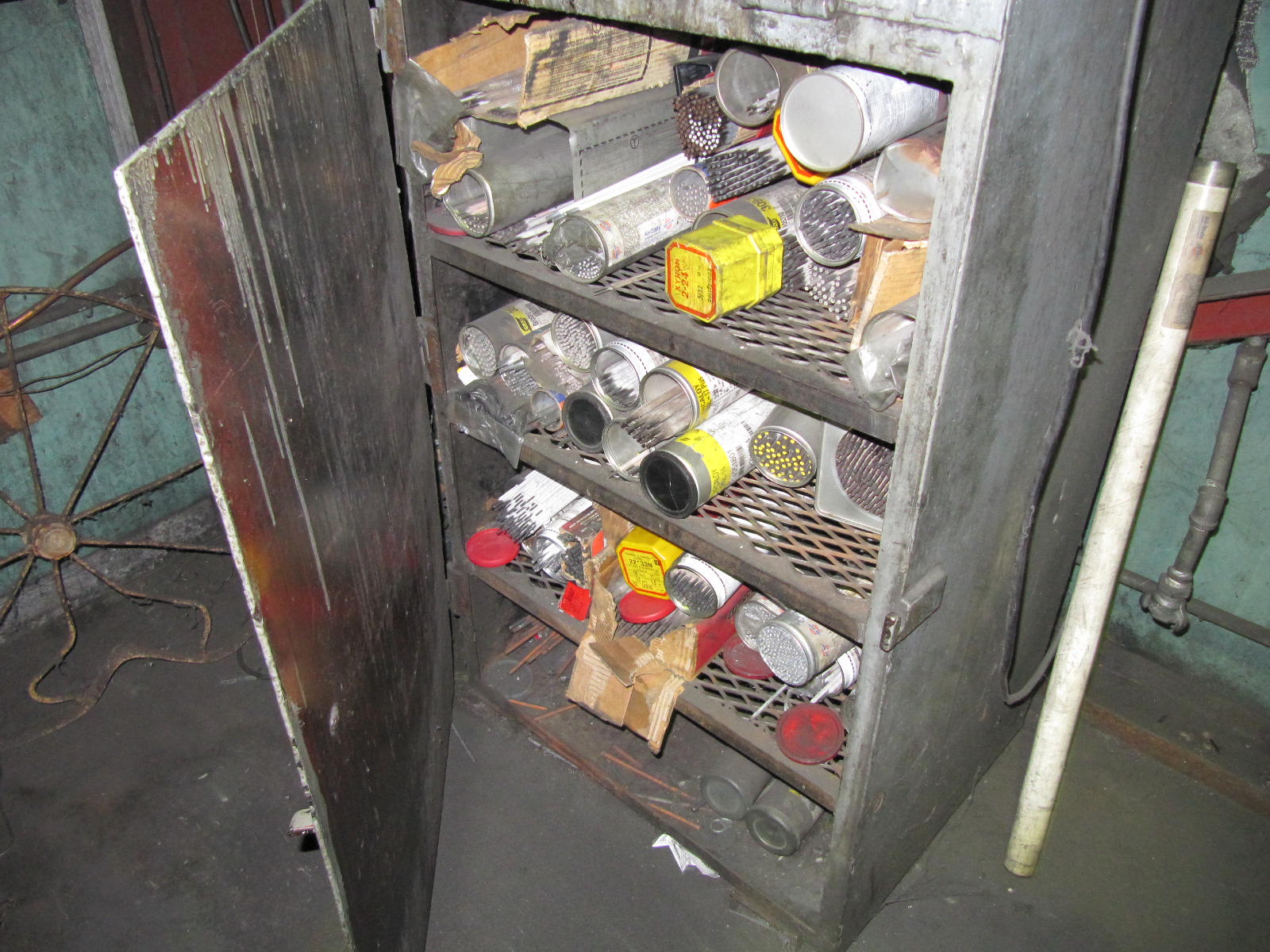 Lot of (2) heated welding rod with assorted rods