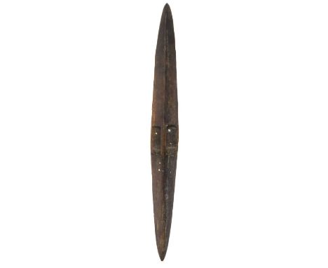 Aboriginal parrying shield,  South East Australia, 19th / 20th century, decorated with incised linear banding,