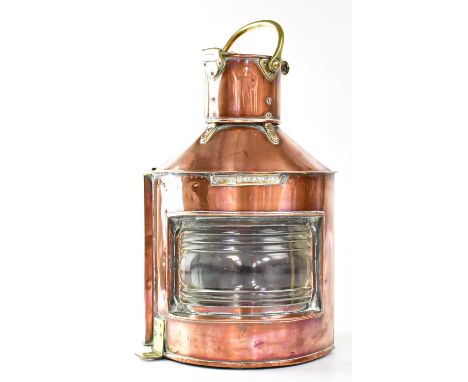 A Bow Port patent no. 23 ship's copper masthead lamp with curved clear lens and brass mounts, height 47cm.