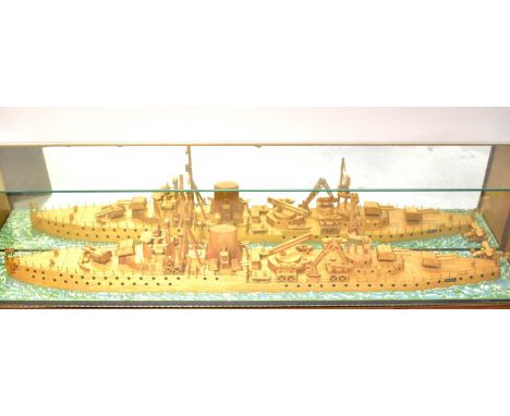 A large unusual scratch-built matchstick scale model of a WWI single-funnel battleship, with applied plaque to each side of t