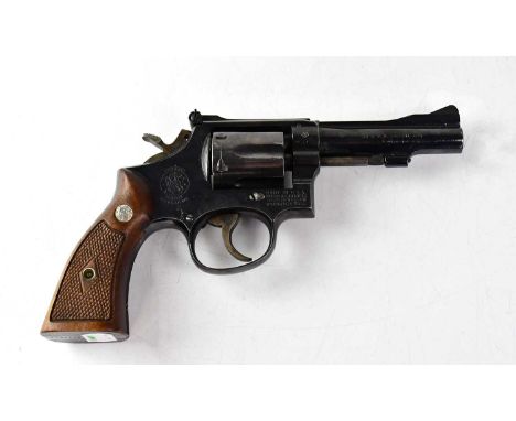 SMITH &amp; WESSON; a deactivated Mod 15 .38" six-shot double action revolver, with 4" barrel stamped to the left with the ma