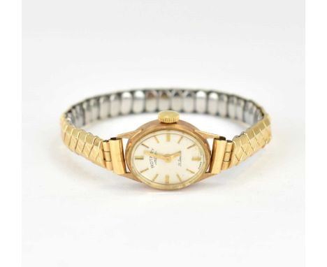 ROTARY; a ladies' 9ct gold wristwatch, the oval silvered dial set with raised baton numerals, twenty-one jewel crown wind mov