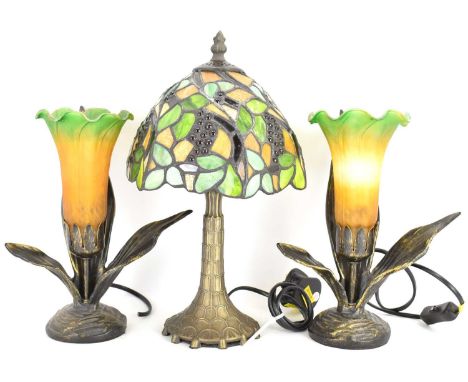 A small modern Tiffany-style table lamp with grape and leaf design, height 32cm, and a pair of modern table lamps in the form
