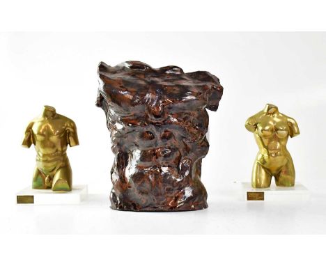 A pair of brass sculptures of a male and female torso by Embryo Sculptures, mounted on Perspex base, height 13cm, together wi