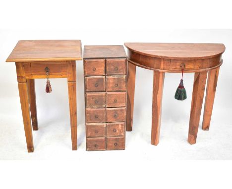 A collection of teak and hardwood furniture comprising a demi-lune table, a square-topped side table, an Eastern carved mirro