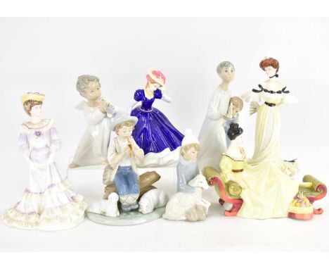 LLADRÓ; two porcelain high gloss figures comprising a boy angel with flute, height 16cm, and young girl with lamb, together w