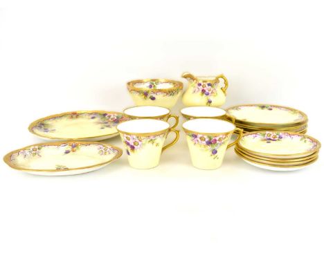 ISABEL ASPDEN CARLETON; a circa 1944 eighteen-piece hand painted porcelain part tea service comprising four cups, four saucer