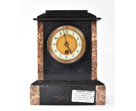 An early 20th century thirty-hour black slate and marble mantel clock, the white enamelled dial set with Arabic numerals, hei