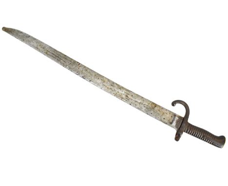 A late 19th century French Chassepot bayonet with ribbed handle and scabbard.