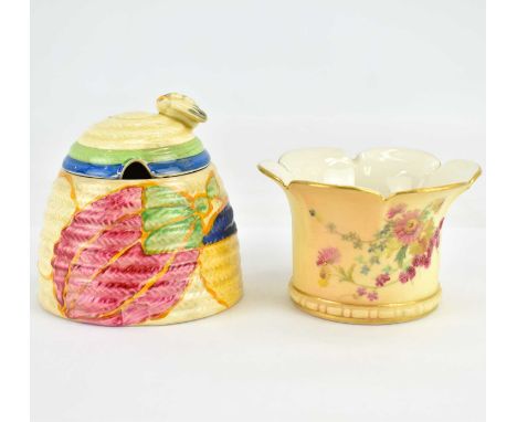 CLARICE CLIFF; a 'Fantasque Bizarre' pattern preserve pot in the form of a beehive with bee finial, 9.5 x 9.5cm, together wit