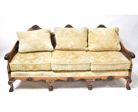 A bergère caned three-seater sofa and two armchairs (3).Condition Report: Unfortunately, all three pieces in this lot have at