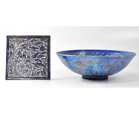 † JULIA CARTER PRESTON (1926-2012; a tile in blue glaze decorated with leaves within a linear border, 16.5 x 16.5cm, together