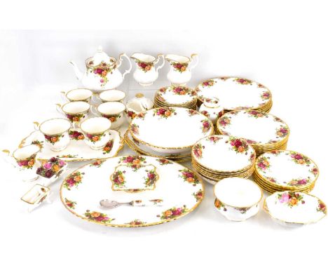 ROYAL ALBERT; approximately fifty-eight pieces of 'Old Country Roses' dinner and teaware to include bowls, plates, footed bow