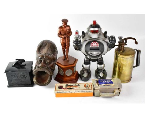 A collector's lot comprising a vintage brass spray gun, a WWI commemorative figure of a soldier, the base set with three penc