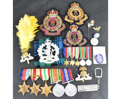 A WWII medal group, badges and ephemera relating to Stanley Briggs of the Lancashire Fusiliers, group comprising War and Camp