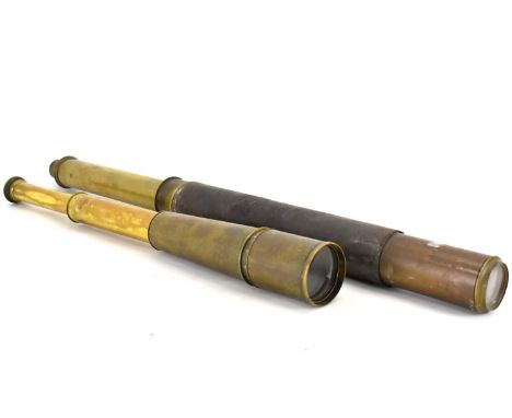 An Aitchinson London 'The Target' 5201 two-draw brass Naval telescope with broad arrow, no. SIG. M. 10353, and a large brass 