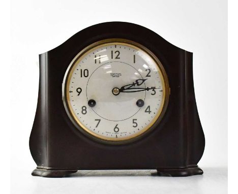 SMITHS; a Bakelite mantel clock, the dial set with Arabic numerals, height 19cm, with key.Condition Report: - Please note tha