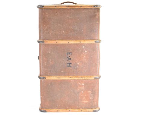 A vintage wooden bound steamer trunk with leather handles and brass fittings, marked 'EAH', 34 x 94 x 53cm.
