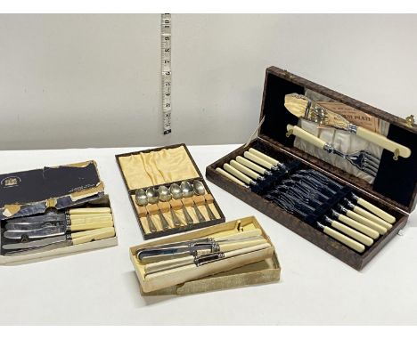 A selection of vintage boxed cutlery 