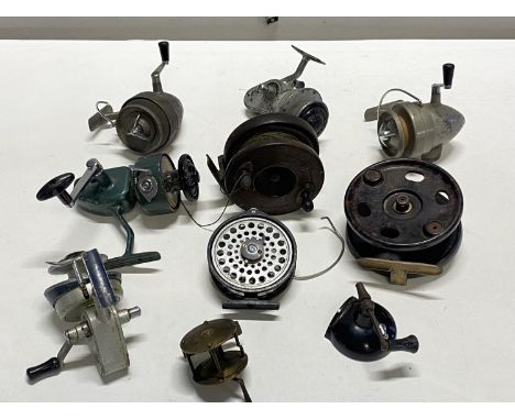 A selection of vintage fishing reels including bakelite examples, shipping unavailable