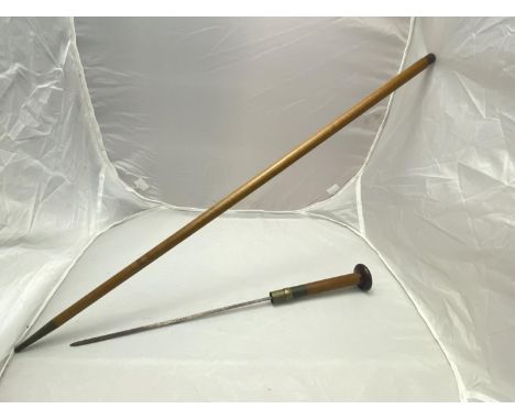 A vintage sword stick with brass handle no postage 